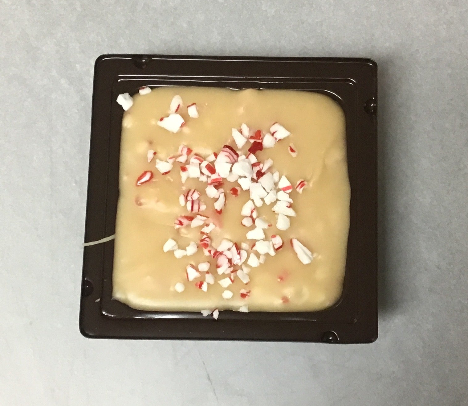 Candy Cane Fudge in a 4 oz square